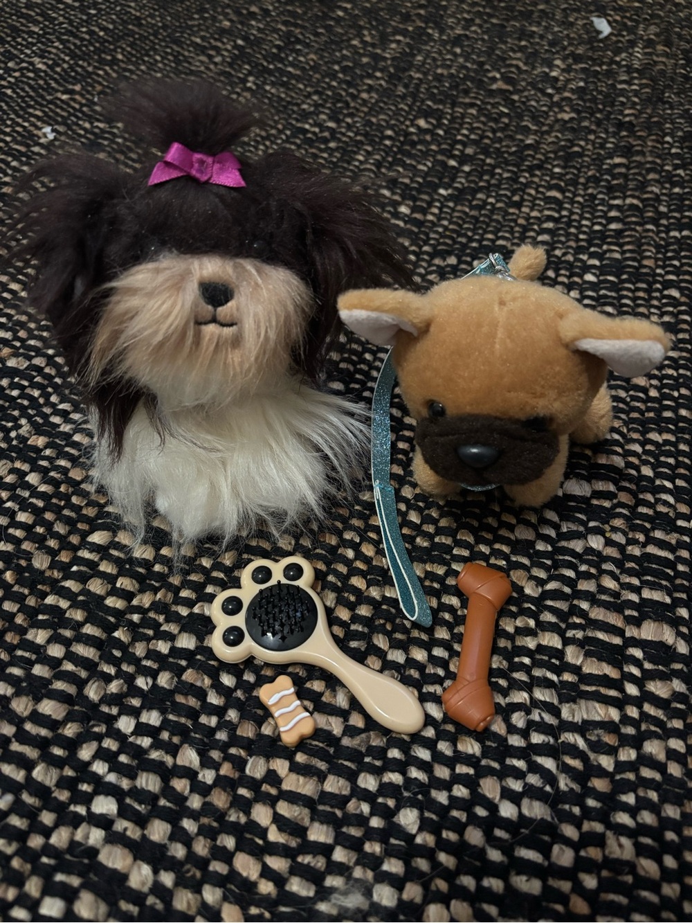 American Girl's Dizzy Dot dog along with a plush puppy